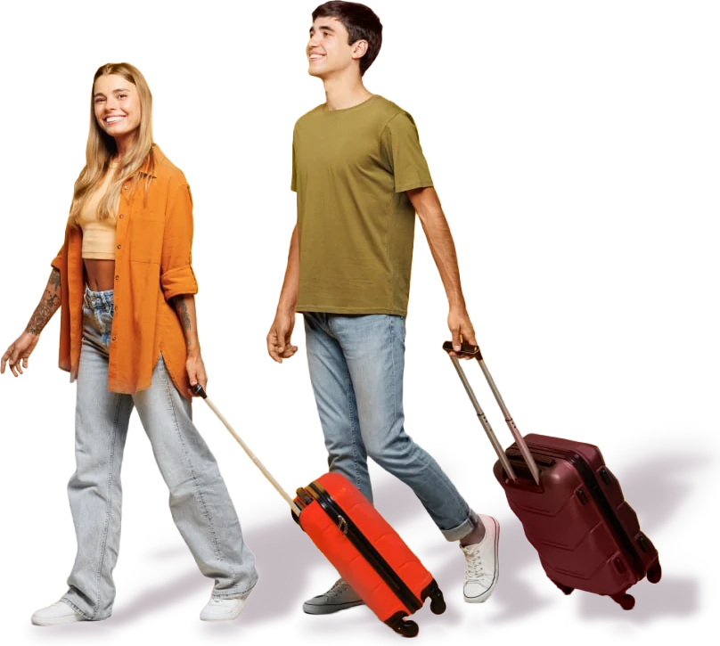 Two travellers walking with suitcases